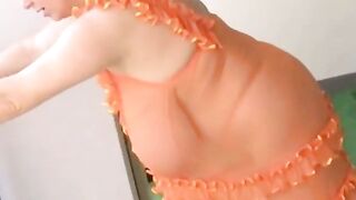 Amateur Busty MILF Shows Off Monster Boobs In Orange Lingerie