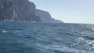 Dark haired cougar Deepthroats Boat Captain Dick Outside on Yacht