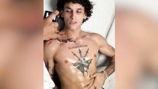 Curly Latino Muscle Stud Gets Oiled Handjob in Bath