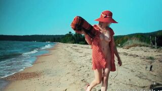 Tiffany walks nude on a sandy beach and fucks with BF