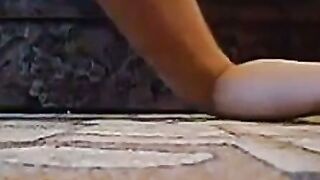 Oiled Russian Girl Strokes Dildo Between Her Thighs in High Heels