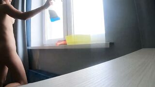 Naked Blonde Amateur Cleans Window with Wet Sponge in Bedroom