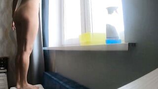 Naked Blonde Amateur Cleans Window with Wet Sponge in Bedroom