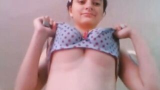 Busty Amateur Cam Girl in Polka Dot Bra Teases with Big Natural Tits
