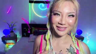 oriental Nico Love Deepthroats Penis inside Neon Rave Outfit