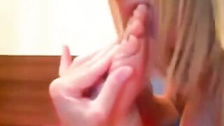 Blonde Licks Her Feet on Webcam