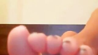 Blonde Licks Her Feet on Webcam