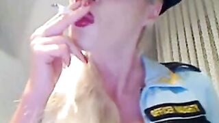 German Blonde Cop Femdom Smokes Cigarette While Dominating Webcam