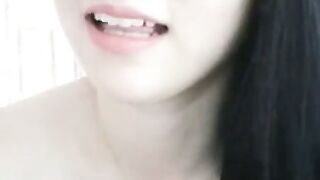 Tiny-Titted Chinese Webcam Girl Teases With Fishnets