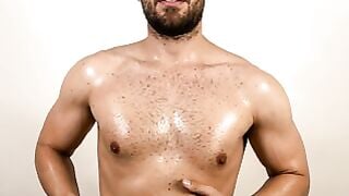 Dan Ferrari Oiled Muscular Solo Masturbation On Gray Sofa