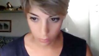 Short-Haired Webcam Girl Strips In Black Bra And Shorts