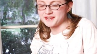 Slim Trans Beauty in Glasses Sucks Pink Dildo for Deep Anal Penetration