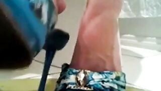 Mature Webcam Model Shows Off Long Black Toenails in Blue High Heels