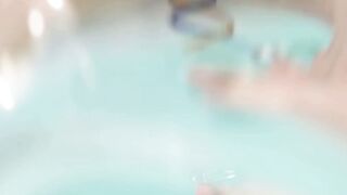 Dark Haired Teen Masturbates Underwater in Sunny Rooftop Jacuzzi