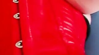 German Amateur Webcam Slave in Red Latex Corset and Heels