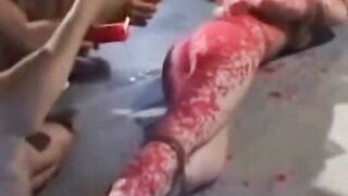 蝋燭責めと鞭打ちされるお姉さん