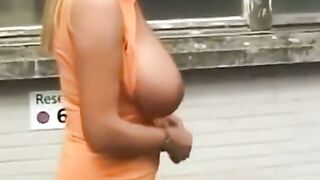 German Amateur MILF Bares Big Natural Tits in Public