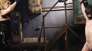 Maitresse Madeline Sucks Hooded Slave's Cock On Dungeon Cross