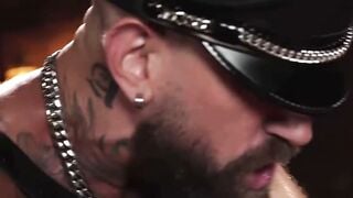 Troy Daniels Roughly Fucks Bound Tattooed Sub in Leather Dungeon