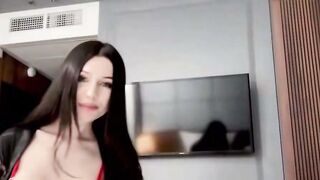 Brunette in Red Harness Deepthroats Hard Cock on Hotel Bed