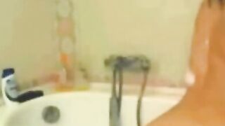 Amateur Babe Showering With Big Natural Tits And Hairy Pussy