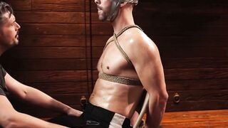 Eddie Patrick Bound & Gagged Jock Deepthroats Massive Cock in Locker Room