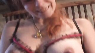 A long vibrator for a big tit young red head