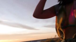Caroline Fucks Glass Dildo on Public Beach in Wet Bikini