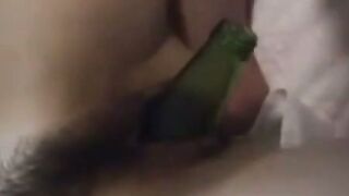 Amateur Asian Gapes Tight Pussy with Glass Bottle