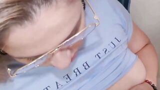 Glasses Wearing MILF Sucks Cock In Bathroom Then Gets Pounded On Floor