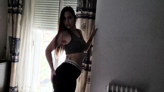 Modeling for a while and showing her breasts