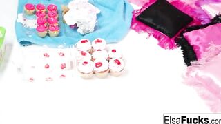 Elsa and Daisy play with some cupcakes and each other