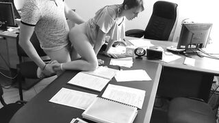 The boss fucks his small secretary on the office table and films it on concealed camera