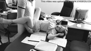 The boss fucks his small secretary on the office table and films it on concealed camera