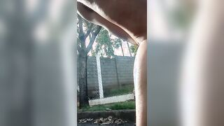 Vulgar women on the street fucking her snatch with her sex toy