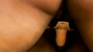 Big Boobed african inside heels and panties uses strap-on with gf