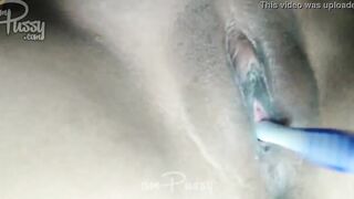 Toothbrush inside vagina close-up
