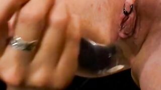 Blonde whore smokes cigarette while eating a soak pink cunt