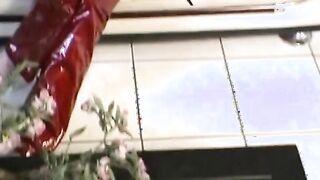 Dark Haired Girl red rubber outfit grind her muff before fucking