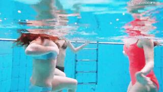 Avenna with Nina Mohnatka and Marketa swimming inside the pool