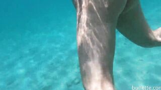 Booty Plug swim and piss on the beach