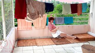 Nude laundry. The maid is drying clothes inside the laundry.
