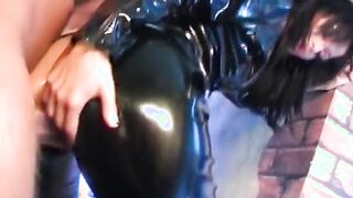 Rubber domina takes lusty stud's rough penis up her booty
