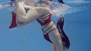 Marfa is adorable Russian pornstar who gets nude into the pool