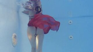 Marfa is adorable Russian pornstar who gets nude into the pool