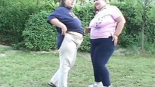 Humongous ladies finger each other's pussies