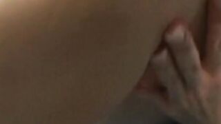 Older woman spreads young cunt with mouth on the bed