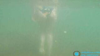 cougar with Huge Titties Masturbates inside the Sea