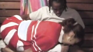 Adorable young lass blows a mean penis inside her bedroom