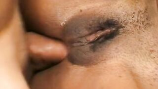 Ebony chick is on her knees sucking off on a dick like a whore